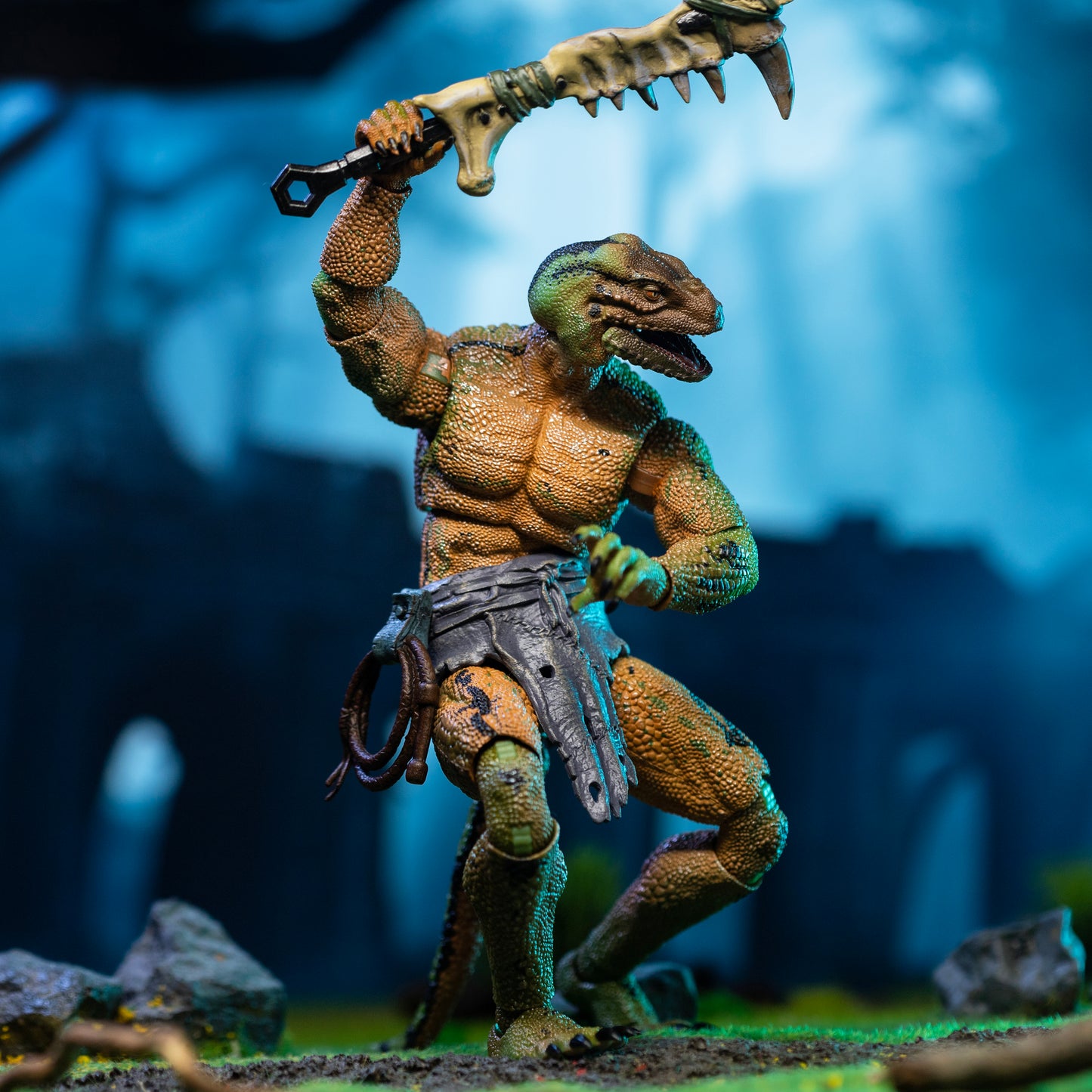 Green, yellow, and black Lemurian in loin cloth wielding mandible club above head and stepping to left.