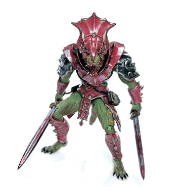 Fully armored green Lemurian with helmet standing in wide footed stance holding a sword low to the ground in each hand.