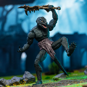 Green Lemurian in loin cloth holding mandible club above head and stomping left leg