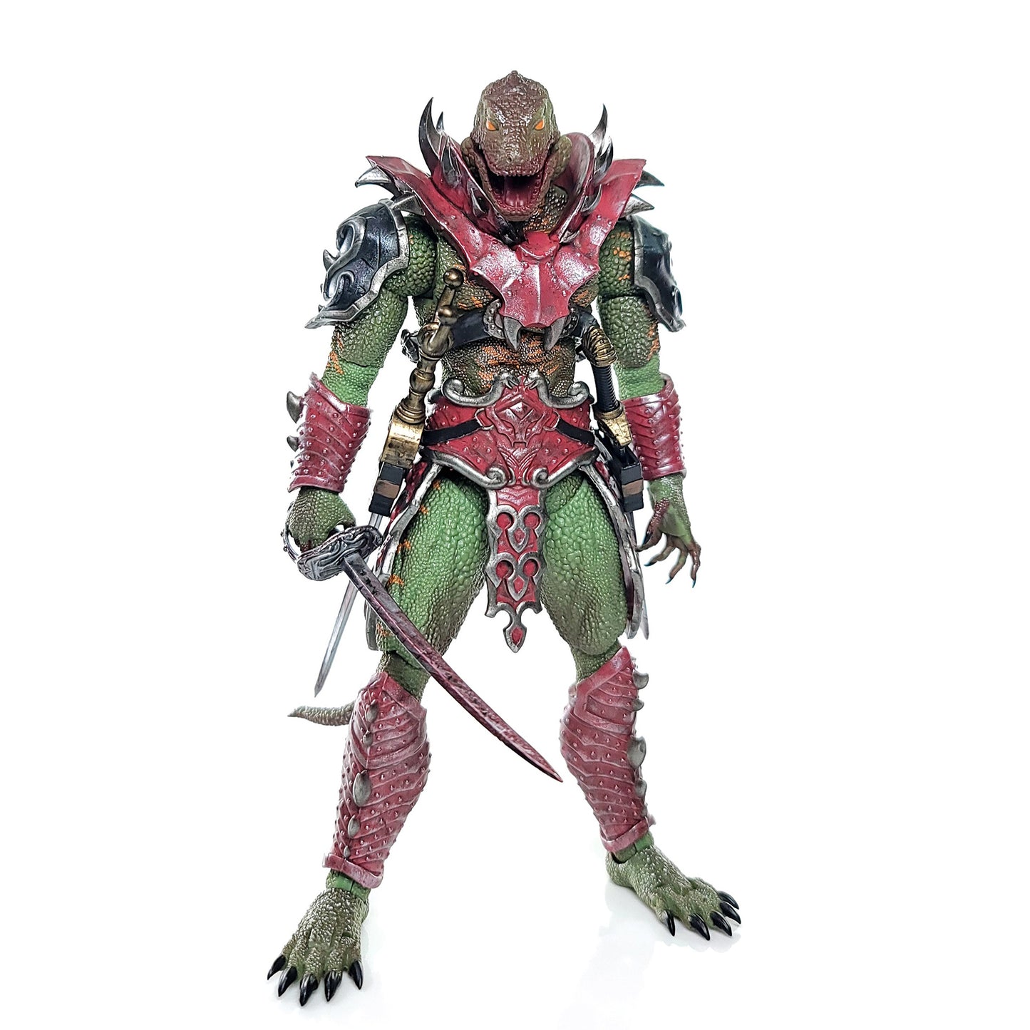 Fully armored green Lemurian standing at ease with a cutlass held low in front of his body in his right hand.