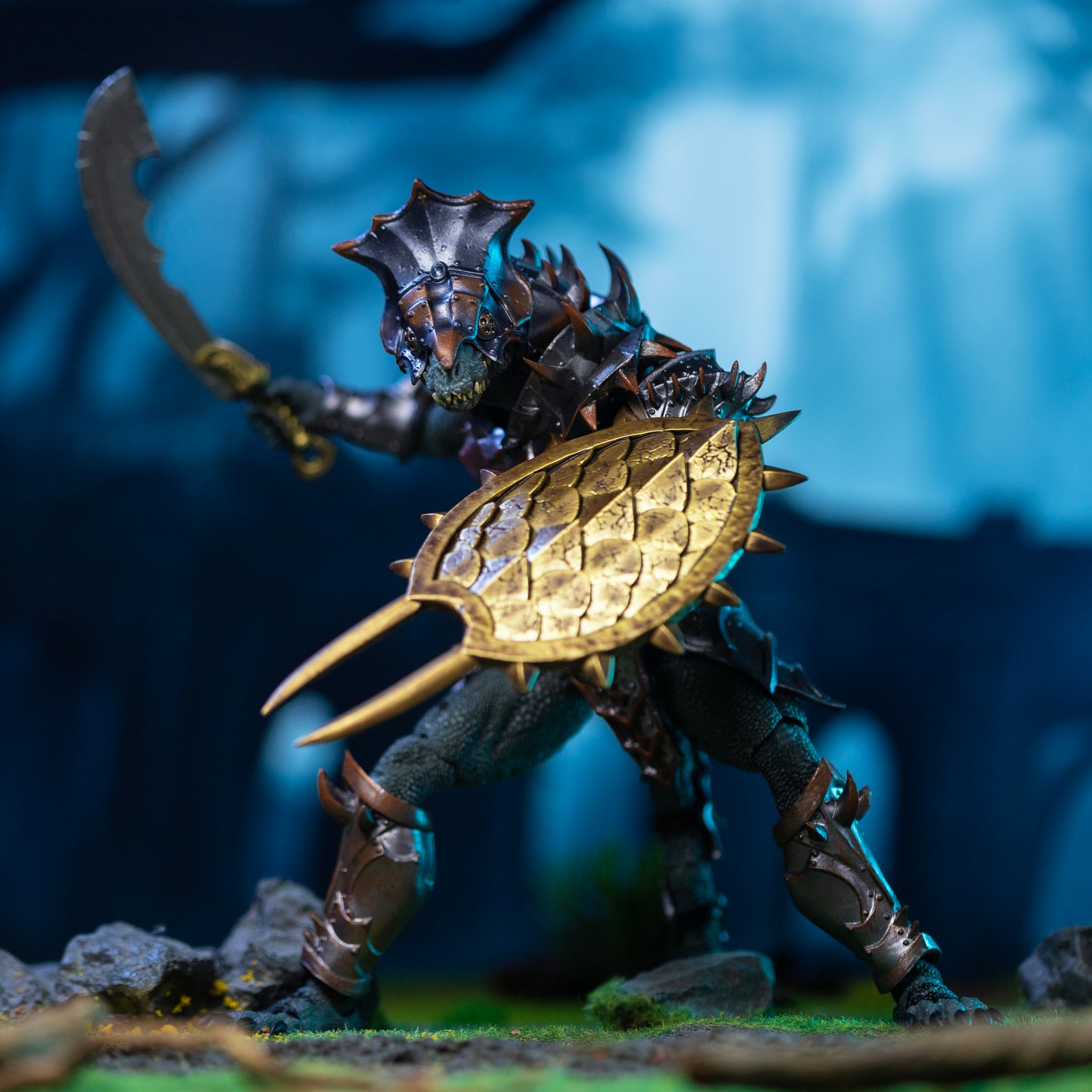 Fully armored green Saurian with helmeted head lunging forward with fanged snake scale shield on his left arm and a sword held up and behind him in his right hand.