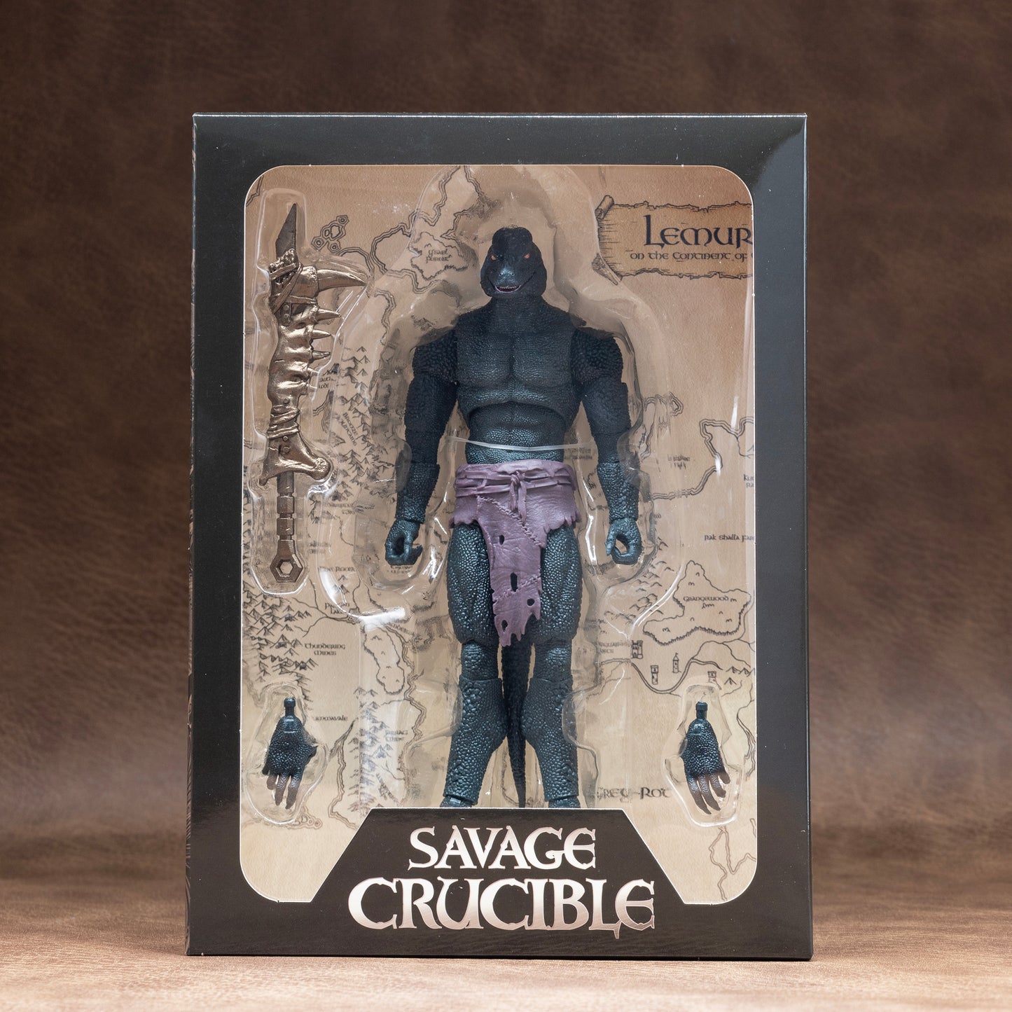 Green Lemurian in loin cloth shown in window box packaging.