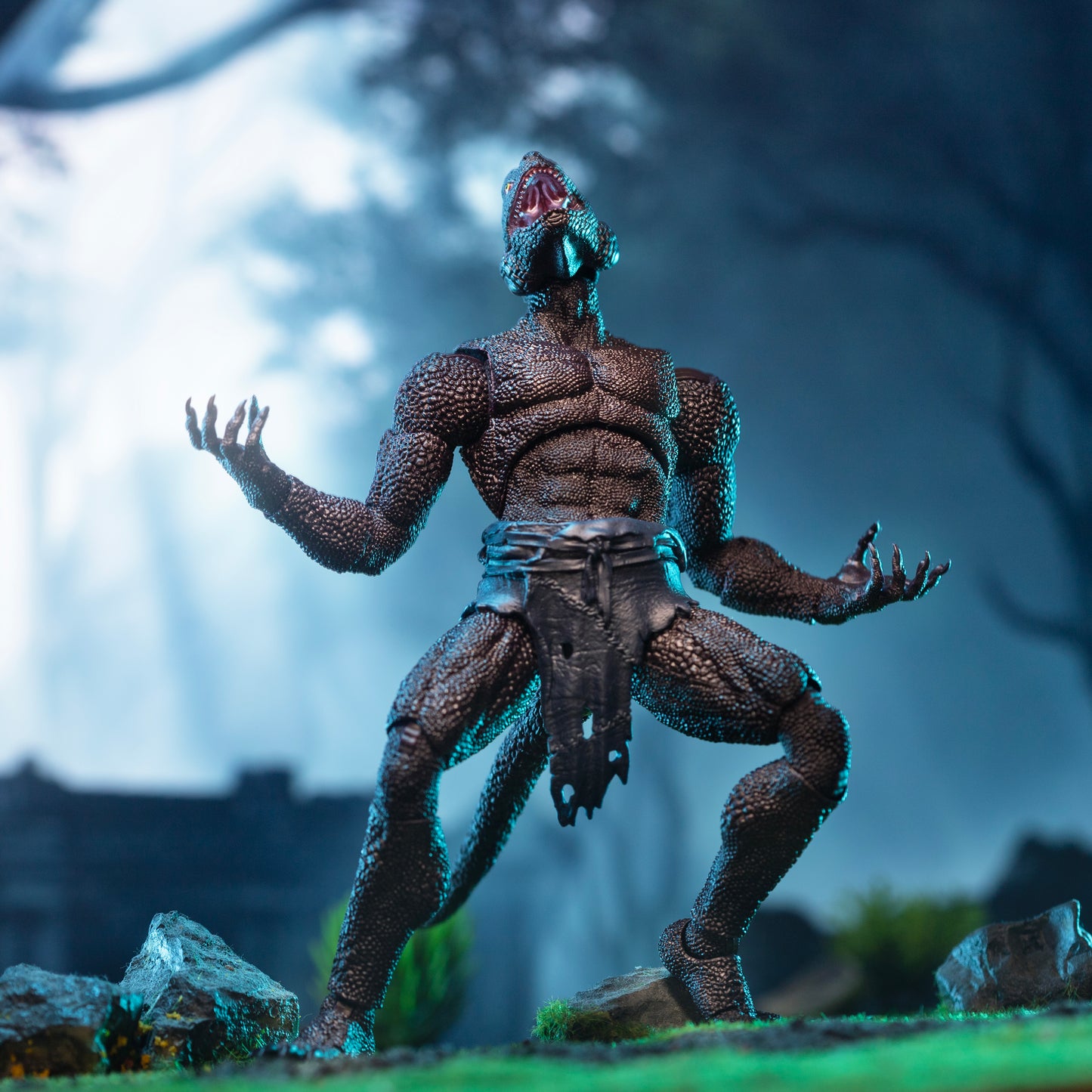 Purple Lemurian in loin cloth throwing his head back and holding his arms wide.